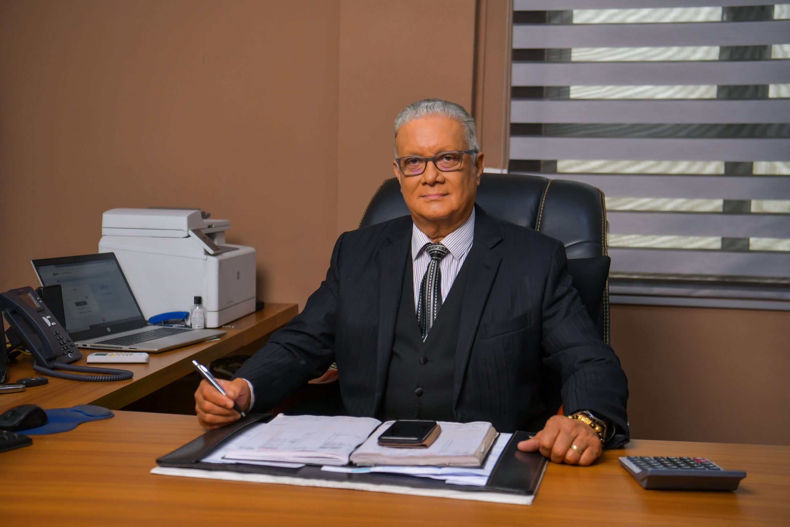 //fscheme.elieandsons.com/wp-content/uploads/2022/01/Roger-Elie-Chairman-scaled.jpg
